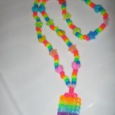 Rainbow Kandi Necklace With Rainbow Fuze Bead Charm.